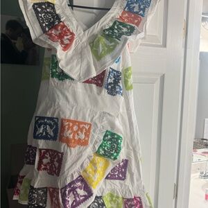 Queen of Sparkles white ruffle papel picado dress